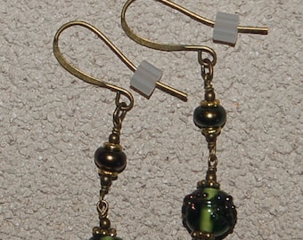 Olive green textured lamp work glass, fresh water pearls and brass beaded earrings for pierced ears