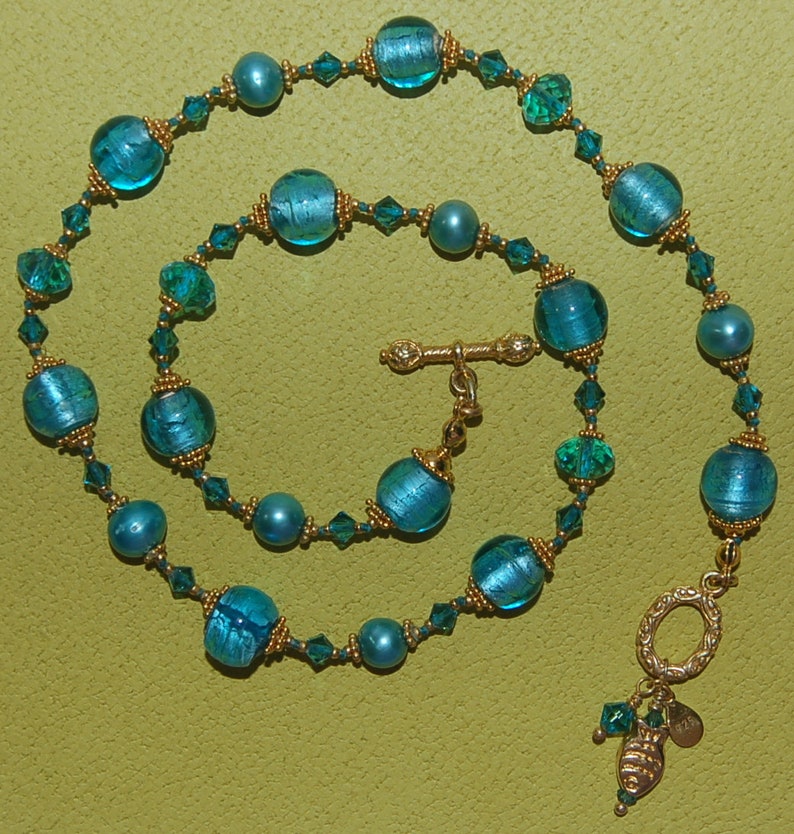 Hand knotted teal and 24k gold vermeil Bali beaded necklace