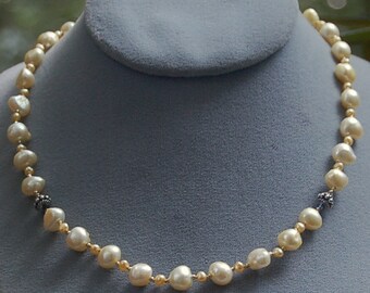 Hand knotted yellow fresh water pearl and Bali sterling silver necklace