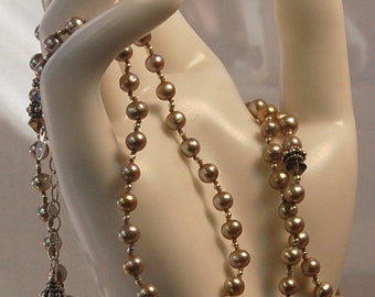 Hand knotted beige/pale green fresh water pearls and Bali sterling silver Opera length necklace