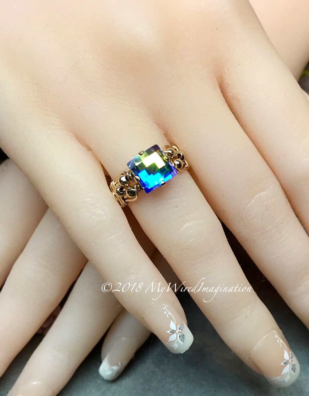 SWAROVSKI/スワロフスキーGLACIER/CRYSTAL RING/水色 Swarovski Lucent Blue-Rhodium-Plated & Swarovski Crystal