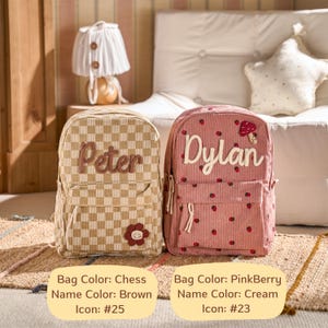 May include: Two personalised backpacks. One is tan with a checkerboard pattern and the name "Peter" in brown. The other is pink with the name "Dylan" in cream and a mushroom icon. Both have front pockets and corduroy texture.