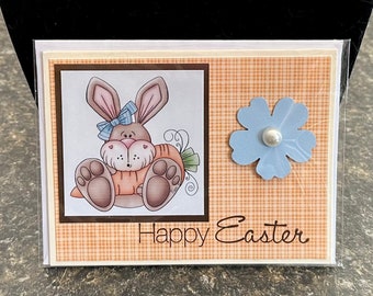 Tarjetas de flores y zanahorias con conejitos de Pascua