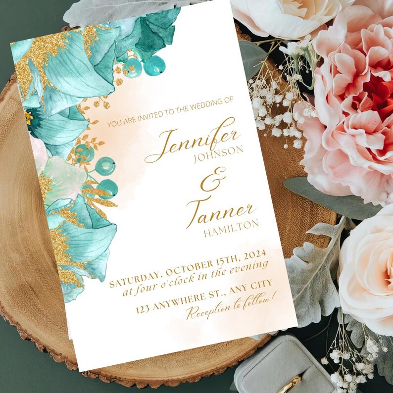 May include: Wedding invitation with a teal and gold floral design. The invitation reads "You are invited to the wedding of Jennifer Johnson & Tanner Hamilton. Saturday, October 15th, 2024 at four o'clock in the evening. 123 Anywhere St., Any City. Reception to follow!"