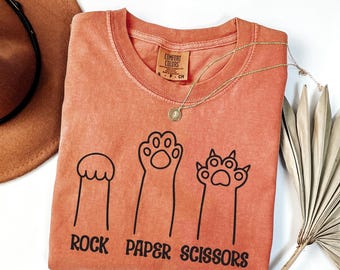 Comfort Colors® Stein Papier Schere Shirt, lustiges Katzen Pfoten Shirt, Unisex Rundhals Shirt für Katzenliebhaber, Katzen Besitzer Shirt, Katzen Pfoten Shirt