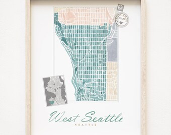 Könnte beinhalten: Gerahmter Aquarelldruck einer Karte von West Seattle, mit Türkis-, Pfirsich- und Grautönen. Der Druck enthält den Text "West Seattle" in einer Schreibschrift und eine kleine Kartengrafik. Eine kleine Stempelgrafik befindet sich in der oberen rechten Ecke.