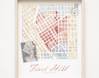 Könnte beinhalten: Ein Aquarelldruck einer Karte von First Hill, Seattle, mit einem rosa Herzen in der Mitte. Die Karte ist von einem weißen Rahmen umgeben.