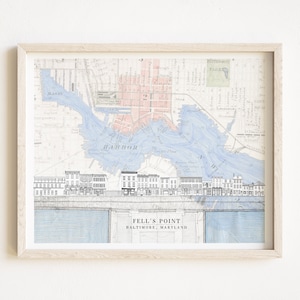May include: A vintage map of Baltimore, Maryland, focusing on Fell's Point. The map is in shades of blue and pink, with a detailed depiction of the harbour and surrounding streets. The text "Fell's Point, Baltimore, Maryland" is printed at the bottom of the map.