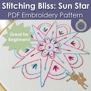 May include: A white embroidery hoop with a colorful sun star design stitched in pink, blue, and purple thread. The text "Stitching Bliss: Sun Star PDF Embroidery Pattern" is at the top of the image. The text "Great for Beginners!" is in a green starburst shape in the lower left corner.