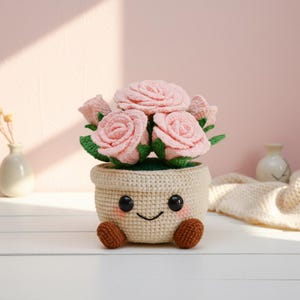 May include: A black ceramic mug with a white floral design. The mug has a curved handle and a glossy finish. The floral pattern includes various flowers and leaves. The mug is likely for beverages.