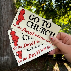 May include: Three white stickers with a red devil cartoon and the text "GO TO CHURCH" and "Or the Devil Will Get You!"