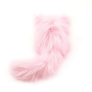 May include: A fluffy pink cat tail, perfect for adding a playful touch to any costume or craft project.