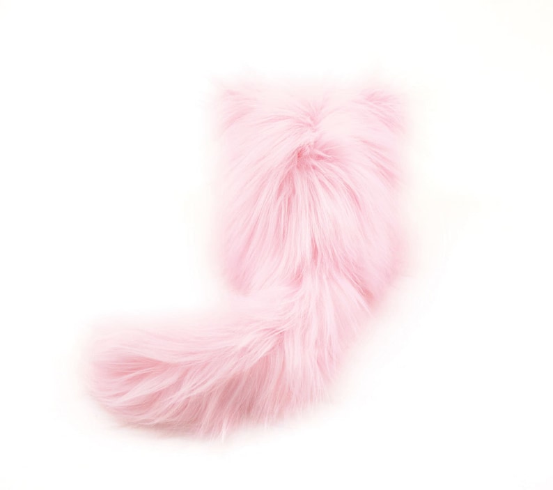 May include: A fluffy pink cat tail, perfect for adding a playful touch to any costume or craft project.