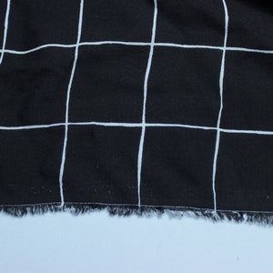 Viscose Fabric with Eye-catching, Black and White Grid Pattern Viscose Fabric, high quality, Clothing fabric, symmetrical pattern position.