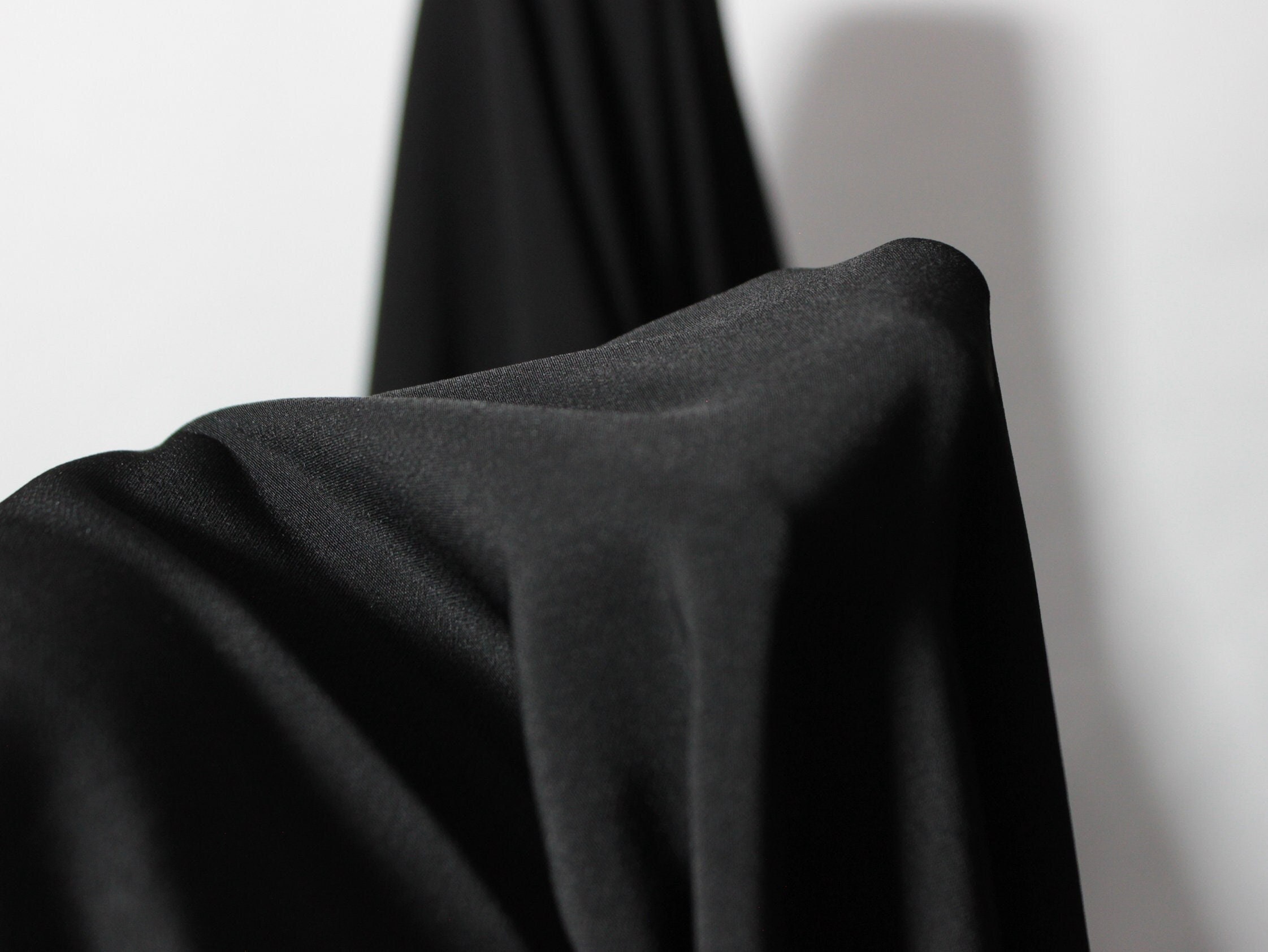 Crystal Crepe Fabric: Black woman