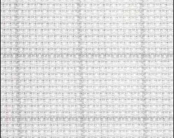 May include: Close-up of a white woven fabric with a textured appearance. The weave pattern is visible, creating a grid-like design. The fabric appears to be made of a light-colored material, possibly cotton or linen, and is suitable for various textile projects.