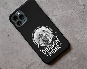 May include: Black phone case featuring a detailed dragon illustration with the text "DRAGON RIDER" and the quote "IN EXISTENCE YOU COULD GO THAT I WOULDN'T FIND YOU". The design is in white against a black background.
