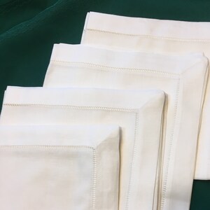 12 linen cotton blend hemstitched ivory 19in. napkins. Embellish your own.