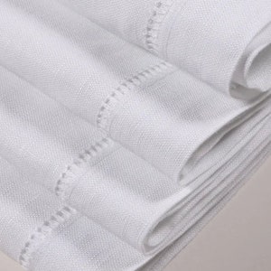 12 linen cotton blend hemstitched white 20in. napkins. Embellish your own.