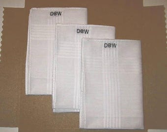 Monogrammed embroidered men's hankies.