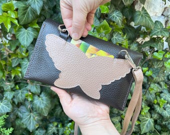 RFID blocking card slotsHandcrafted Leather Crossbody iPhone Wallet: Travel Clutch with Butterfly Pocket