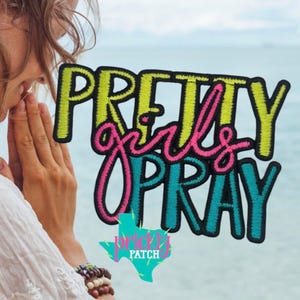May include: Embroidered patch with the words "PRETTY Girls PRAY" in yellow, pink, and teal. The patch has a black border and a Texas-shaped logo at the bottom. The background is a blurred image of the ocean.