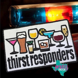 May include: Embroidered patch featuring various cocktail glasses, including a martini, beer, wine, and margarita. The text "thirst responders" is stitched in black. A Texas-shaped logo is in the bottom right corner.