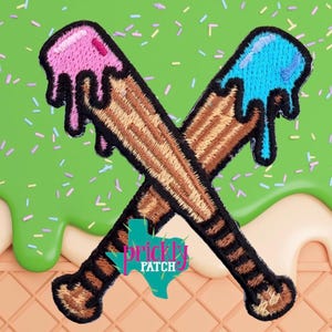May include: Embroidered patch featuring two crossed baseball bats with dripping ice cream. One bat has pink ice cream, the other blue. The bats are brown with black accents. The patch has the text "Prickly Patch" in a Texas-shaped logo.