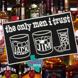 May include: Black rectangular patch with white embroidered text and graphics. The text reads "the only men i trust" above three drink illustrations: "JACK" with ice cubes, "JIM" with ice and a cherry, and a shot of "JOSE" with a lime wedge.