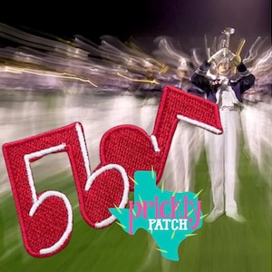 May include: A red embroidered musical note patch with a white border. The patch features a double-beamed sixteenth note design. A teal-colored graphic shaped like the state of Texas with the text "PRICKLY PATCH" is overlaid on the image.
