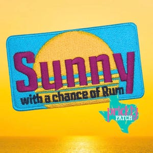 May include: A rectangular embroidered patch featuring a bright blue background with a large yellow sun. The text Sunny is stitched in purple, and the text with a chance of Rum is stitched in black. A small teal Texas-shaped logo is visible.