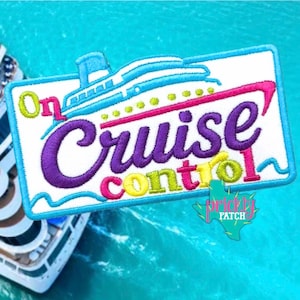 May include: A rectangular embroidered patch featuring a white background with a blue cruise ship outline at the top. The text reads On Cruise control in purple, pink, and lime green thread. The patch has a blue border and a teal watermark logo.