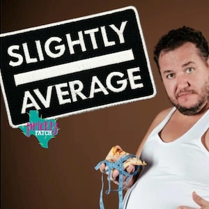 May include: A black and white patch with the words "SLIGHTLY AVERAGE" in white lettering. The patch is rectangular and has a white horizontal line. The image also includes a person holding pizza and a measuring tape.