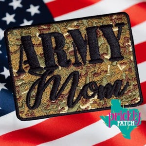 May include: Embroidered patch with the words "ARMY Mom" in black thread on a camouflage background. The patch is rectangular and set against an American flag. The Prickly Patch logo is in the lower right corner.