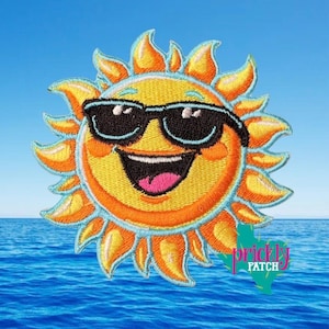 May include: Embroidered patch featuring a smiling sun wearing sunglasses. The sun is yellow and orange with a black mouth and sunglasses. The patch has a blue border and the text "prickly PATCH" in a teal and pink color.