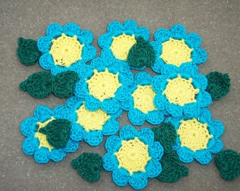 10 yellow and blue crochet applique flowers with leaves  --  3180