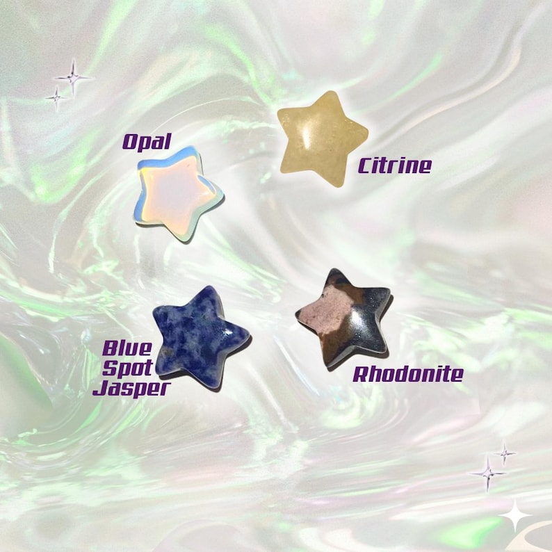 May include: Four star-shaped gemstones: Opal, Citrine, Blue Spot Jasper, and Rhodonite. The Opal is iridescent, the Citrine is yellow, the Blue Spot Jasper is dark blue, and the Rhodonite is black and pink. The names of the gemstones are written on the image.