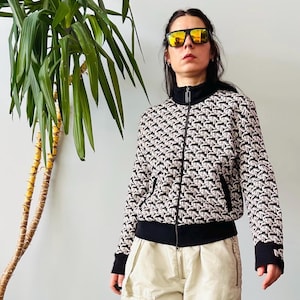 Y2k Marc Cain ユニセックス アクティブウェア ブラック プリント ジップ カーディガン / スウェット ジャケット、ドイツ製ニット、サイズ UK 14 / EU 40