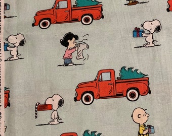 Springs Creative - © Peanuts Worldwide  - Red Truck Christmas - Authentic Licensed Fabric - Quilting Cotton - Christmas Fabric