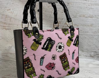 Haunted Psychobilly Luau - Top Handled Sparkle Vinyl Handbag or Crossbody Purse  with Zipper Charm Closure - Tiki Halloween Monsters