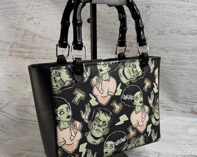 Frank and Bride - Top Handled Vinyl Handbag or Crossbody Purse  with Zipper Charm Closure - Spooky Halloween Monsters