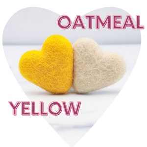 May include: Two felt hearts, one yellow and one oatmeal, on a white background. The word "YELLOW" is below the yellow heart and the word "OATMEAL" is above the oatmeal heart.
