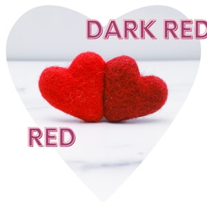May include: Two red felt hearts, one a darker shade of red than the other, are placed side-by-side on a white surface. The text "DARK RED" is above the hearts and the text "RED" is below the hearts.