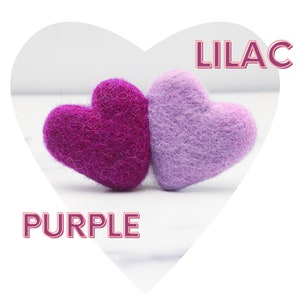 May include: Two felt hearts, one purple and one lilac, with the words "PURPLE" and "LILAC" written below them.
