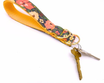 MEADOW Floral Laminated Cotton Wristlet Keychain: Navy & Coral Meadow Print