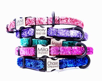 May include: Five colorful glitter dog collars with personalized silver name tags. The collars are stacked on top of each other. The name tags have the names "Jane", "Molly", "Scout", "Mila", and "Chase Chipped" with corresponding phone numbers.
