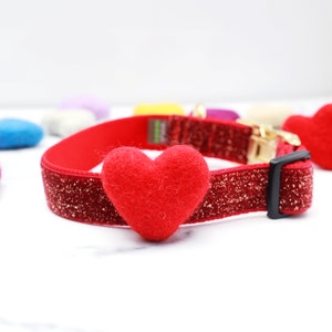 May include: Red glitter dog collar with a red felt heart charm.