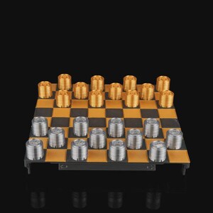 May include: A complete checkerboard set with gold and silver pieces. The board has a black and gold checkered pattern. The pieces are cylindrical and arranged on the board, ready for play. The background is black.