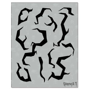 May include: A gray stencil sheet featuring a repeating pattern of skulls and stars. Overlaid are several black, jagged shapes, resembling cracks or lightning bolts. The text "Stencil 1" is printed in the bottom right corner.