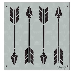 May include: A stencil with four black arrow designs. The arrows are pointing to the right and have a simple, tribal-inspired design.